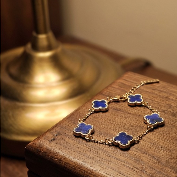 T Tahari Jewelry - Tahari Elegant Gold and Blue Clover Bracelet